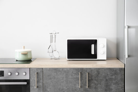 Modern Microwave Oven In Kitchen