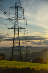 electricity pylons at sunset