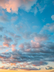 An orange sky textured background. Vertical orientation