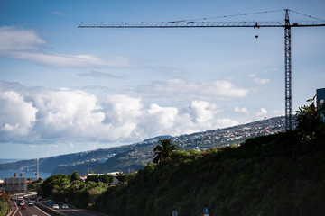 construction crane on Islands in the background of the mountain