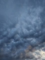 dark gray storm clouds after the rain