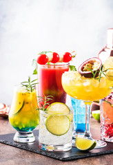Selection of summer alcoholic cocktails, popular bright refreshing alcohol drinks and beverages