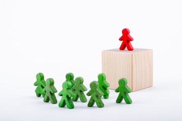 Successful team leader (manager, CEO, market leader) and another business leading concepts. Standing out from the crowd. Leadership concept.