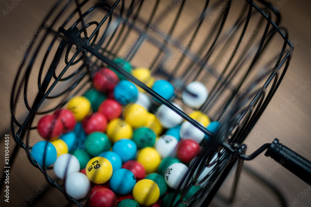 Wall mural A bingo ball cage with colorful balls inside. 