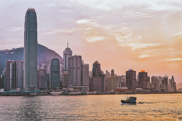 Obraz premium Water boat and Victoria Harbor of Hong Kong. View from Kowloon on HK Island.