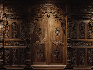 Javanesse door with javanesse batik and flower Pattern is carved on wood background