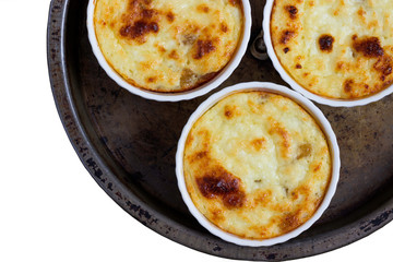 Cottage cheese casserole with raisins  isolated on a white background.