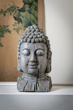 a sculpture of Buddah face