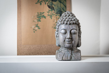 a sculpture of Buddah face