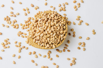 Mahlab seeds on white background. Aromatic spice made from the seeds of a species of cherry, used in small quantities to sharpen sweet foods. Used in Greek, Turkish, Middle East cuisine.