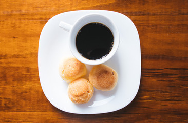 Brazilian snack cheese bread and coffee