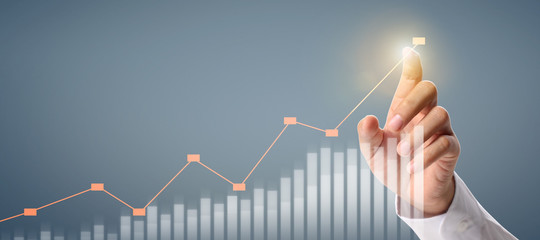 Businessman plan graph growth and increase of chart positive indicators