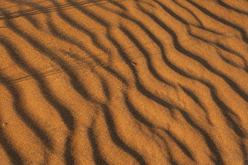 Fototapeta na wymiar Closed up shot of sand texture at Dubai Desert