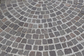 A typical Italian pavement: Sampietrini (or Sanpietrini). Black and white.