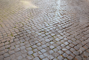 A typical Italian pavement: Sampietrini (or Sanpietrini). Black and white.