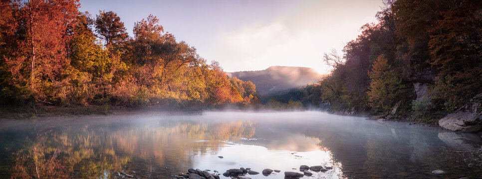 Panorama of Sunrise above Foggy River