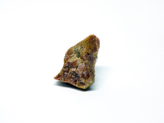 the stone is isolated on a white background. isolated brown stone with sharp edges for cutting as a template.