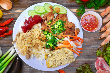 Com Tam - Closeup of vietnamese food: Delicious broken rice with egg pie and BBQ pork chop. fried...