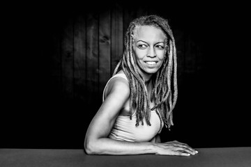 Black and White Portrait of a Smiling African American Woman Looking Left