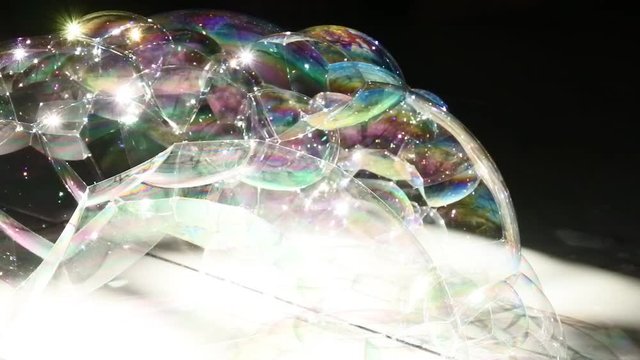 footage of soap bubbles that have erupted