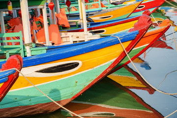 Colorful traditional wooden Vietnamese tourist boats, Hoi An
