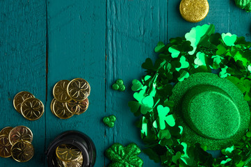 St. Patrick's Day celebration, on green wooden background, top view
