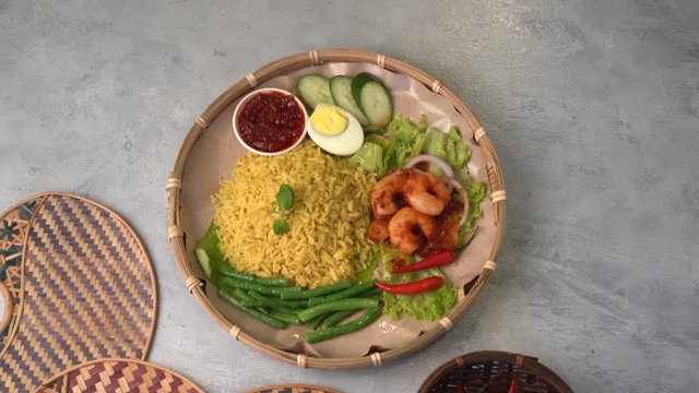 turmeric rice or nasi kunyit popular asian food with shrimp