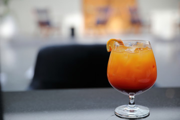 Sunrise Cocktail orange pineapple juice in restaurant
