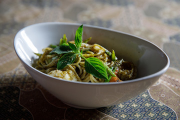 Pesto Spaghetti with shimp in high contrast italian food