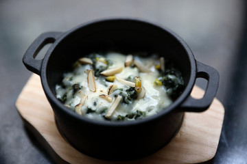 Spinach Cheese Bake on wooden plate apptizer