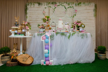 Luxurious table of sweets and birthday cake