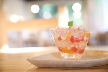 Japanese dessert jelly with fruit on wood plate