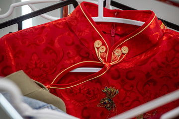 Close up Red cheongsam on the clothes line
