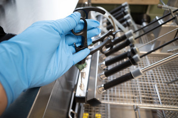 in a central sterilization department, the instruments used for an endoscopic operation are placed in a washing basket for endoscopic instruments