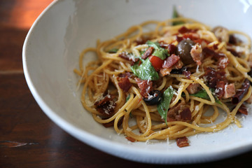 Dried Chili and Bacon Spaghetti on wood background