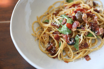 Dried Chili and Bacon Spaghetti on wood background
