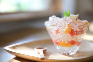 Japanese dessert jelly with fruit on wood plate