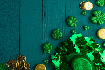 St. Patrick's Day celebration, on green wooden background, top view