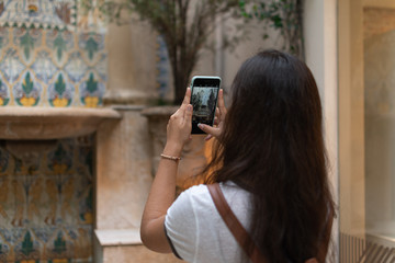 young girl take a photo