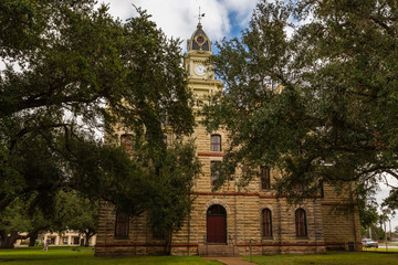 Built in 1894 of local, rough-cut limestone, the Goliad County (Texas) Courthouse is still in active use today