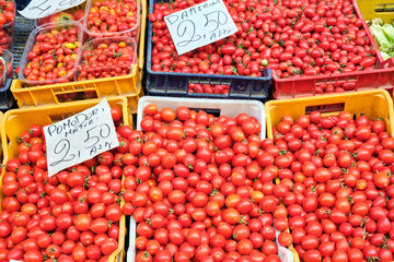 Small cherry tomatoes for sale at a market