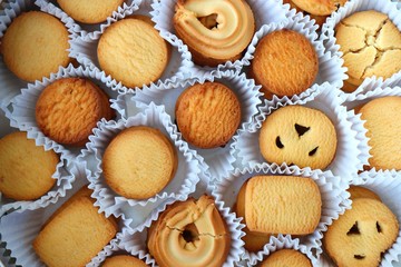 An overhead or flat lay view of Danish butter cookies in the traditional tin box. valentines day gift. with copy space