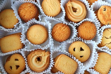 An overhead or flat lay view of Danish butter cookies in the traditional tin box. valentines day gift. with copy space