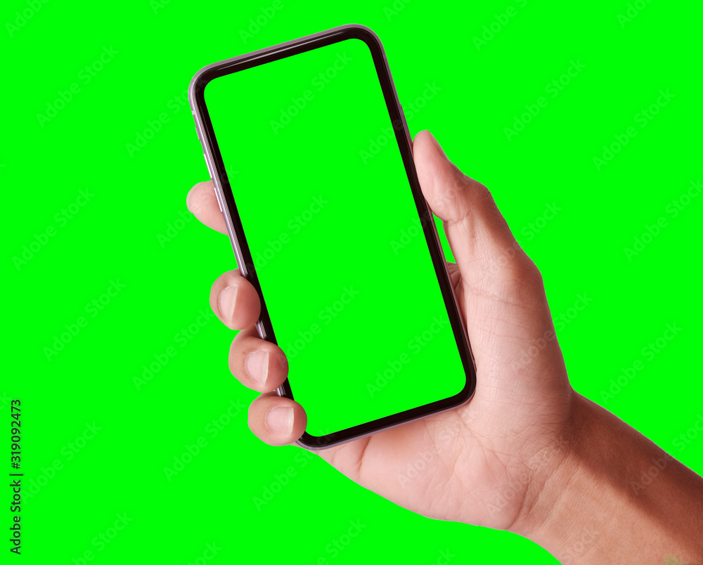 Poster studio shot of hand shows mobile smartphone with green screen in vertical position isolated on backg