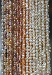 multicolored pearls in the form of beads as a background