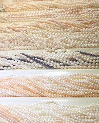 multicolored pearls in the form of beads as a background