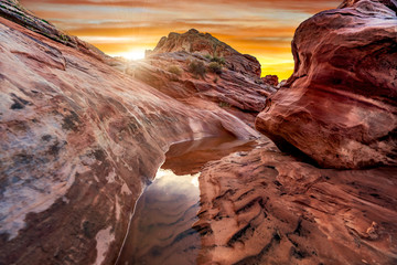 The mesmerizing red rock layers and formations of the desert landscape at the Valley of Fire State...