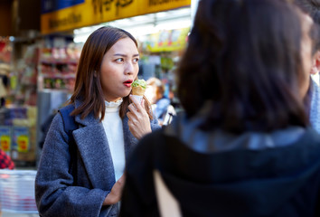 Portrait of young asian woman outdoors