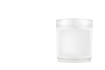 White candle in transparent glass with white blank label on isolated, mock up for branding identity...