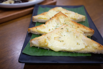 Cheese Garlic Bread Cut into pieces, place in a plate